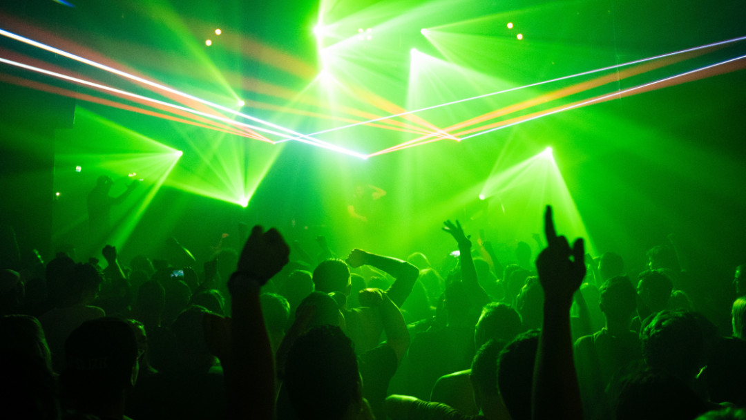 green lasers in a full night club